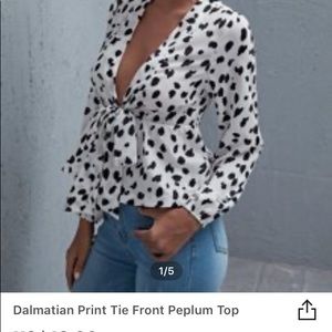 Spotted peplum top